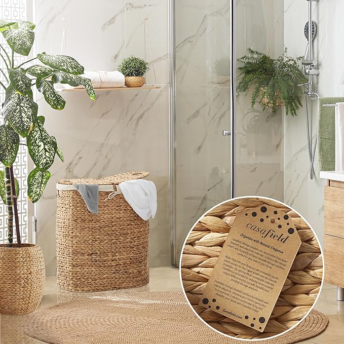 Casafield Oval Laundry Hamper with Lids and Removable Liner Bags - Natural, Woven Water Hyacinth 2-Section Laundry Basket Sorter for Clothes and Towels